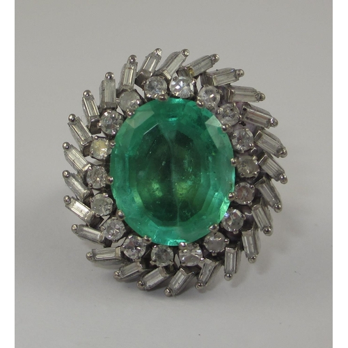 75 - A substantial emerald and diamond ring