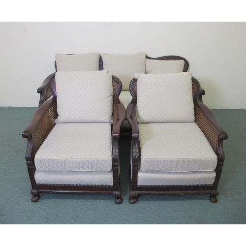 753 - A carved mahogany double cane Bergere settee  with a pair of matching armchairs