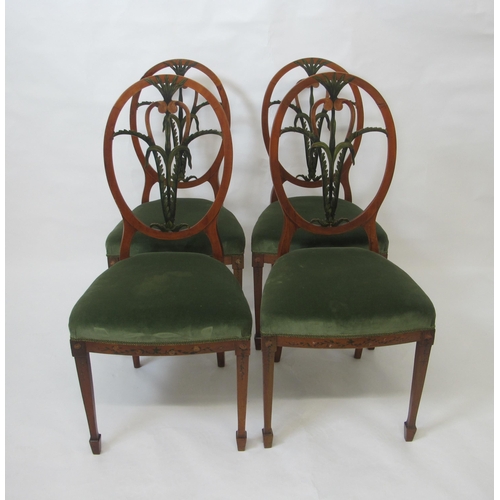 761 - A set of four Edwardian satinwood dining chairs in the Hepplewhite manner