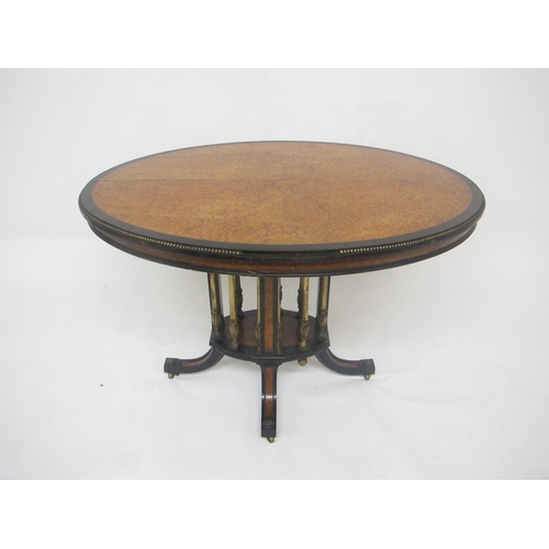 789 - A Victorian birds eye maple and ebony oval loo table