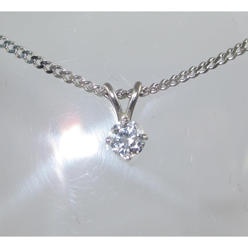 79 - A solitaire diamond pendant