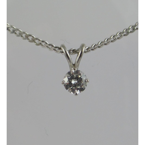 79 - A solitaire diamond pendant