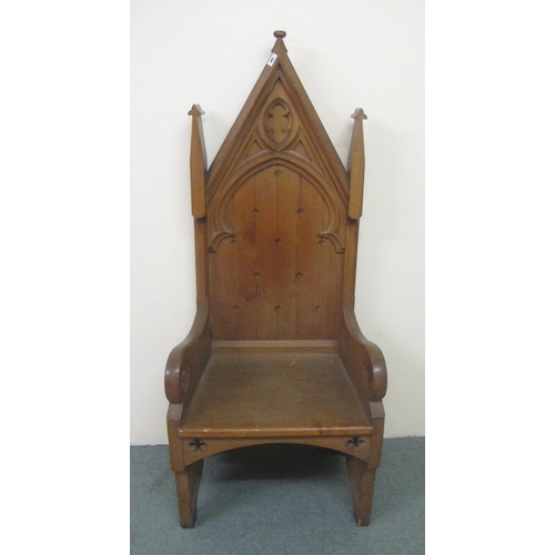 807 - A Gothic Revival church carved oak armchair