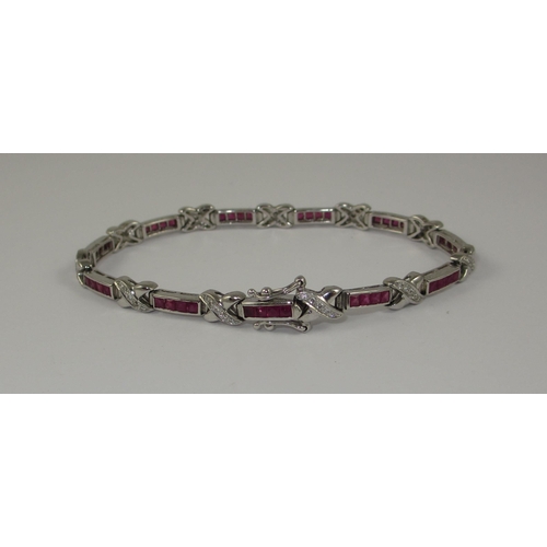 81 - An 18ct diamond and ruby bracelet