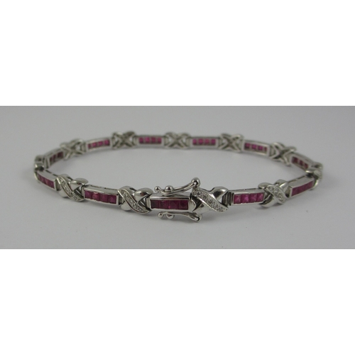 81 - An 18ct diamond and ruby bracelet