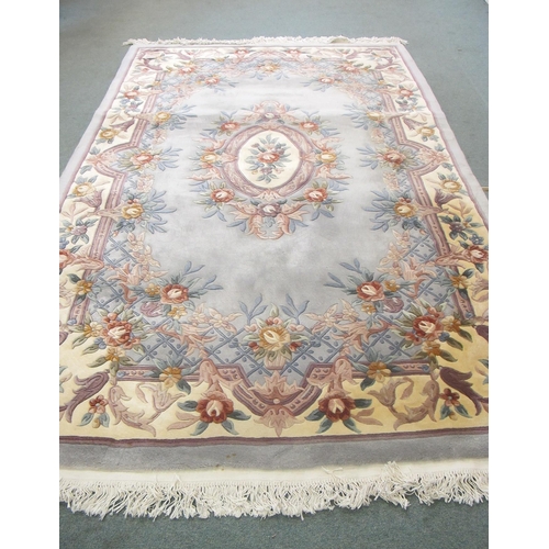 810 - A Chinese hand made floor rug