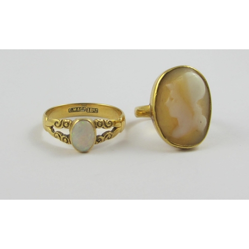 103 - An 18ct opal set ring together with a shell cameo of a classical maiden. Approx weight 6.6gms.