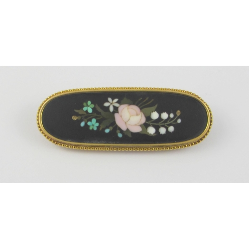 107 - A 'pietra dura' Brooch  featuring roses  lily of the valley  and forget me nots  mounted in yellow m... 