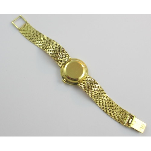 12 - An 18ct yellow gold herringbone strapped ladies wristwatch  by 'International Watch Co.' Approx 28.6... 