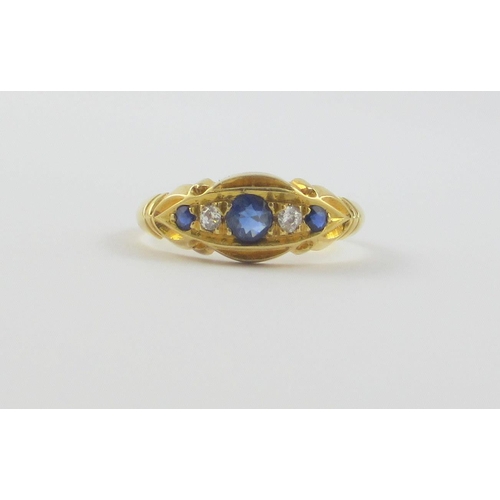 124 - An 18ct yellow gold sapphire and diamond ring  hallmarks for Birmingham 1859. Ring size O.