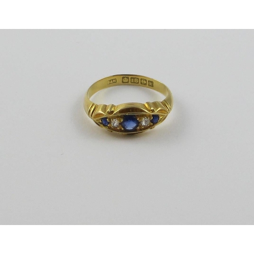 124 - An 18ct yellow gold sapphire and diamond ring  hallmarks for Birmingham 1859. Ring size O.