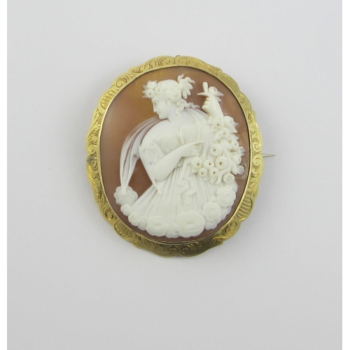 125 - A good quality shell cameo  depicting a classical maiden with roses.