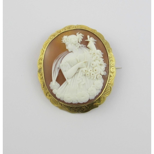 125 - A good quality shell cameo  depicting a classical maiden with roses.