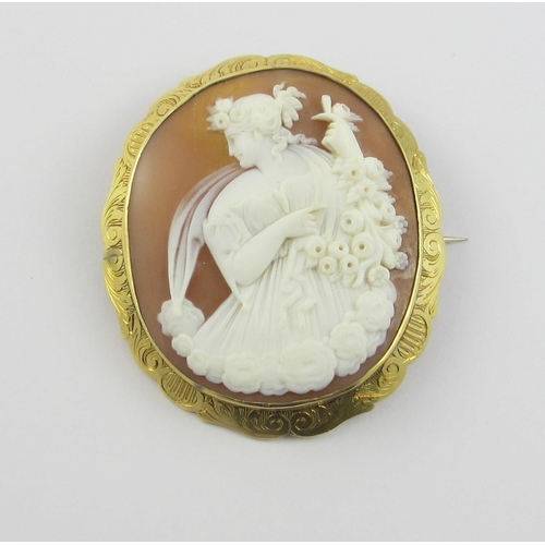 125 - A good quality shell cameo  depicting a classical maiden with roses.