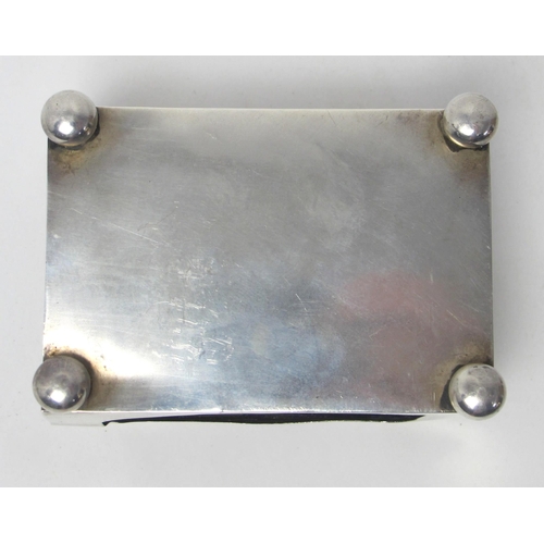 153 - A pictorial silver matchbox holder