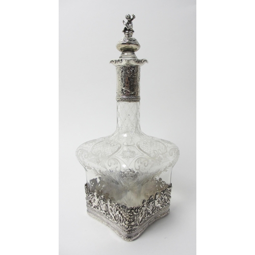 155 - A continental etched glass decanter with silver base  collar and stopper