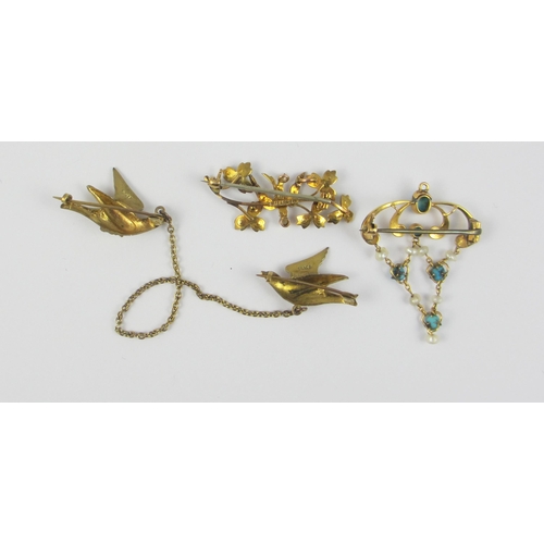 78 - Three Victorian brooches  to include a seed and fresh water pearl and turquoise yellow metal example... 