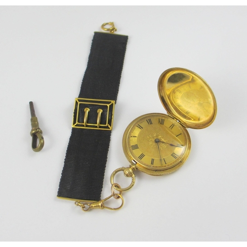 79 - an 18ct yellow gold cased fob watch by Mottu Geneve  the case extensively engraved with flowers and ... 