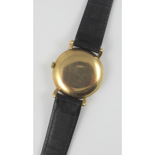 80 - A 9ct cased 'Rolex' watch. Serial numbers on the case 4516 364  on good leather strap.