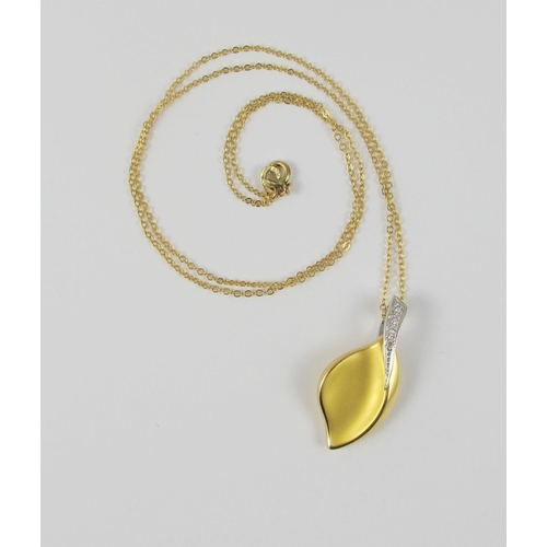 84 - A diamond set 18ct yellow leaf design pendant on a chain. Approx 3.3gms