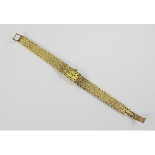 94 - a 9ct ladies wristwatch with integral 9ct woven strap. Approx weight 24.7gms.