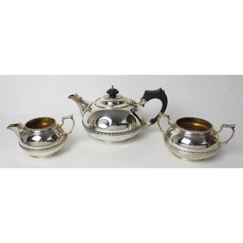 166 - A three piece silver tea service