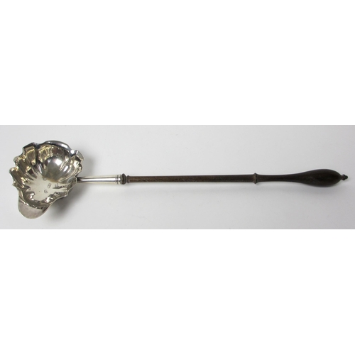 180 - A late George II silver bowled toddy ladle