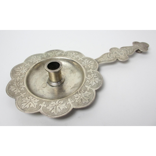 188 - A religious silver candle holder