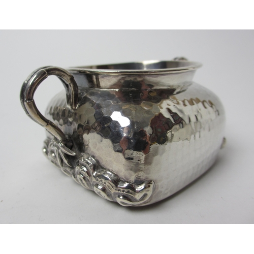 193 - A three piece Chinese silver tea service