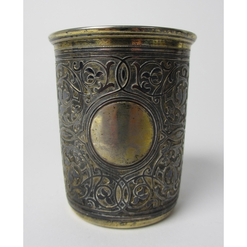 216 - A Russian silver niello vodka cup