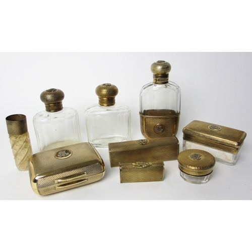 225 - An Edwardian ladies silver gilt toilet set