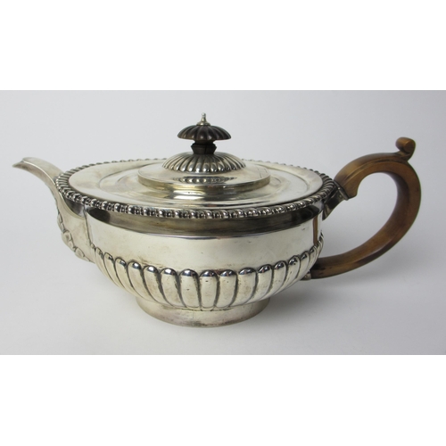 228 - A Victorian silver teapot