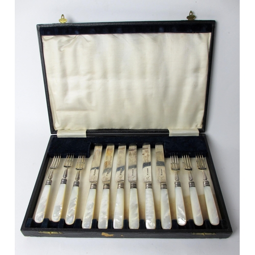 229 - A cased Victorian silver and mother of pearl twelve fruit cutlery set