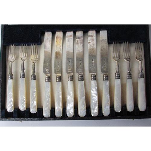 229 - A cased Victorian silver and mother of pearl twelve fruit cutlery set