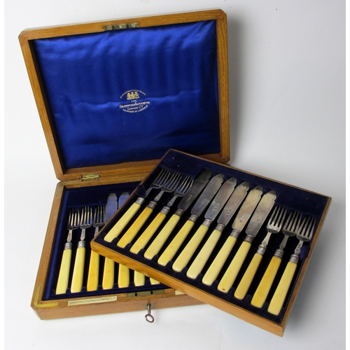 230 - A cased Edwardian silver and bone handled 24 piece fish cutlery set