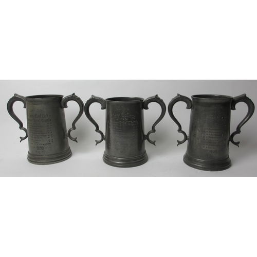 299 - Three pewter two-handled Cambridge College Crested trophies