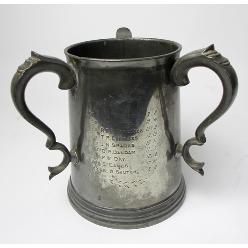 316 - A pewter three handled tyg Jesus College  Cambridge Trial Eights 1888