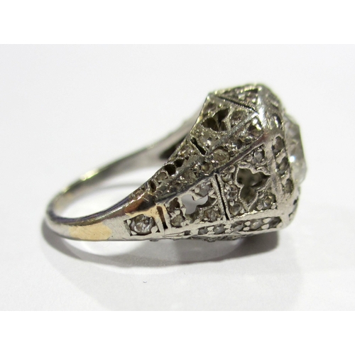 63 - An early 20 th century white metal diamond solitaire ring