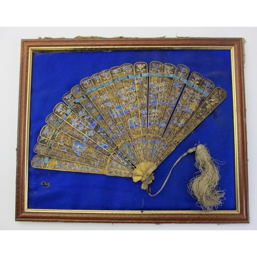 669 - A Chinese gilt metal and enamel fan