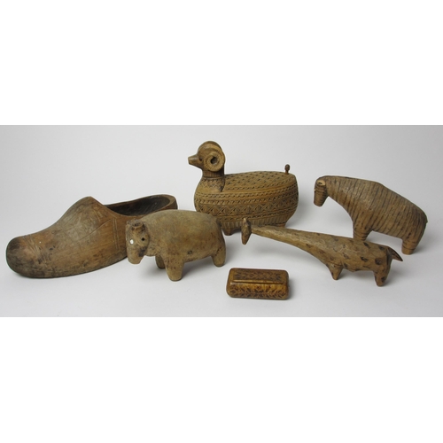 682 - Four Russian carved treen toys