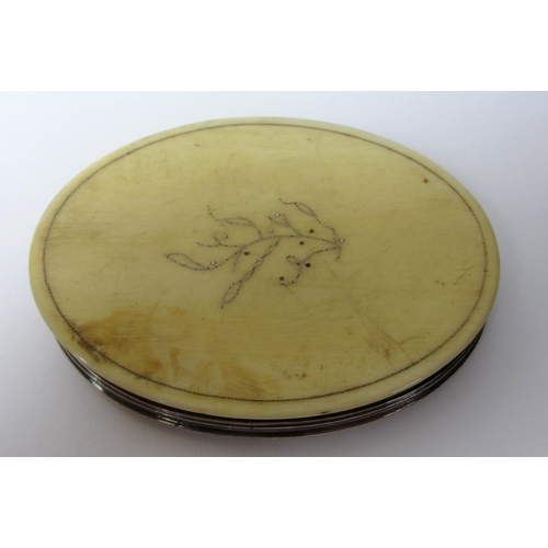 693A - An ivory pique ware oval snuff box