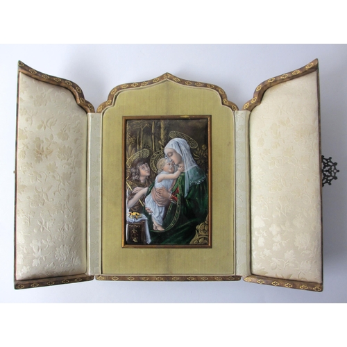 695 - A Limoges enamel plaque of the Madonna and Child