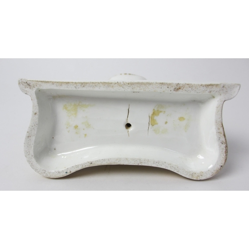 722 - An English porcelain pocket watchstand