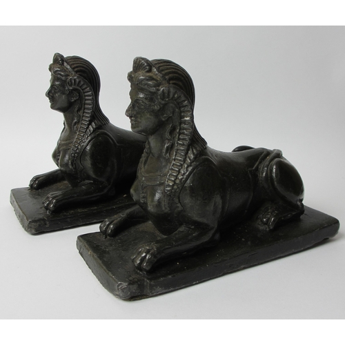 734 - A pair of Regency lead painted model of sphinxes