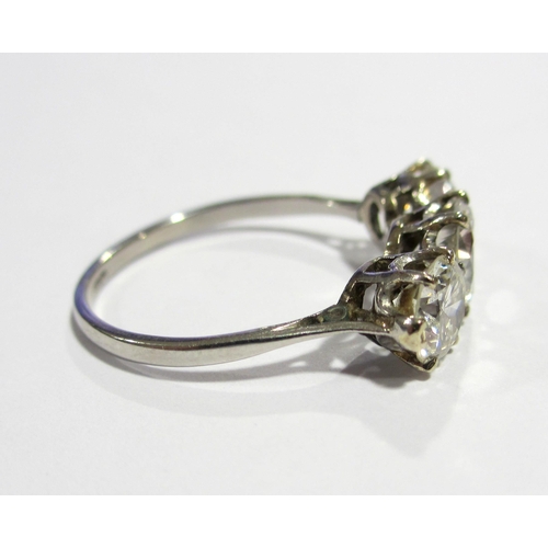 76 - A platinum diamond three stone ring