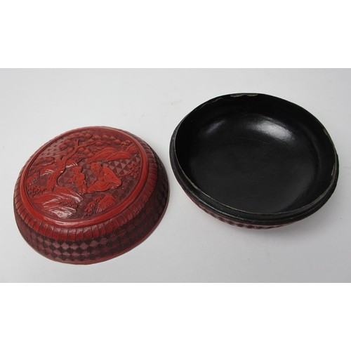 793 - A Chinese cinnabar red lacquer circular box and cover