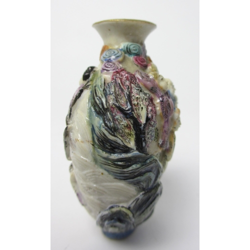 794 - A Chinese porcelain moulded snuff bottle