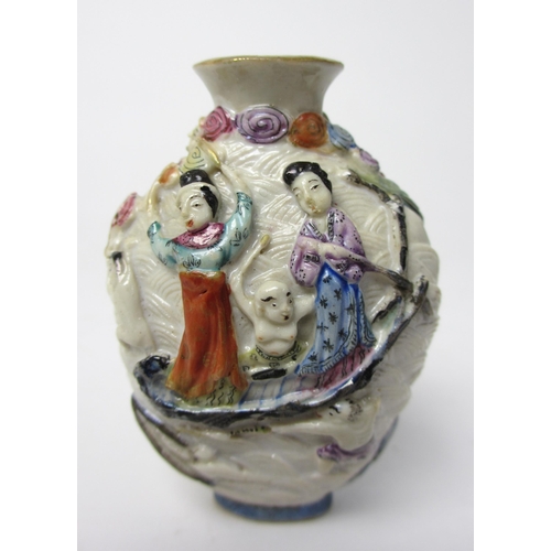 794 - A Chinese porcelain moulded snuff bottle