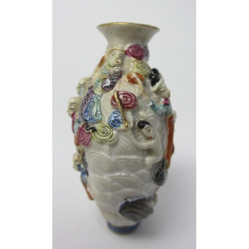 794 - A Chinese porcelain moulded snuff bottle