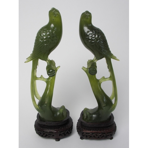 796 - A pair of Chinese jadeite models of peacocks